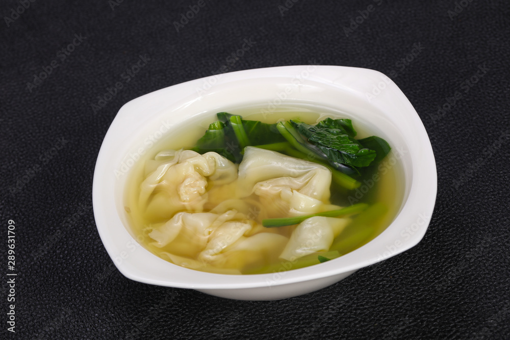 Asian traditional Wonton soup with herbs Asian traditional Wonton soup with herbs