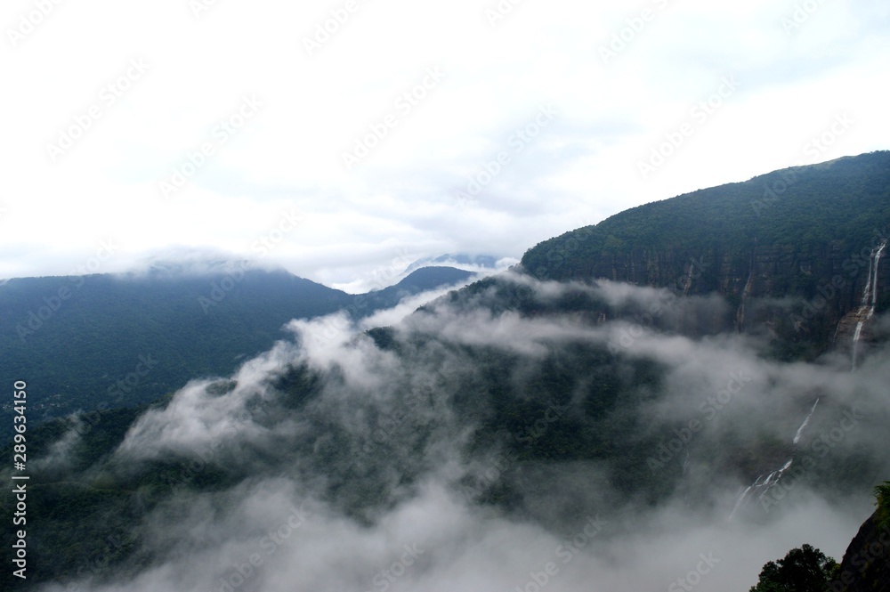 Beautiful clouds are covering the mountains in ahill station