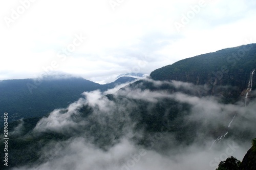 Beautiful clouds are covering the mountains in ahill station © ABHIJIT