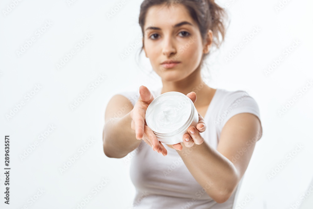 young woman holding light bulb young woman holding light bulb