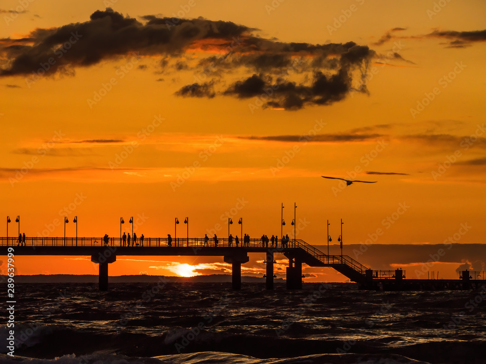 Miedzyzdroje Pier with the sunset sky , Baltic Sea, Poland
