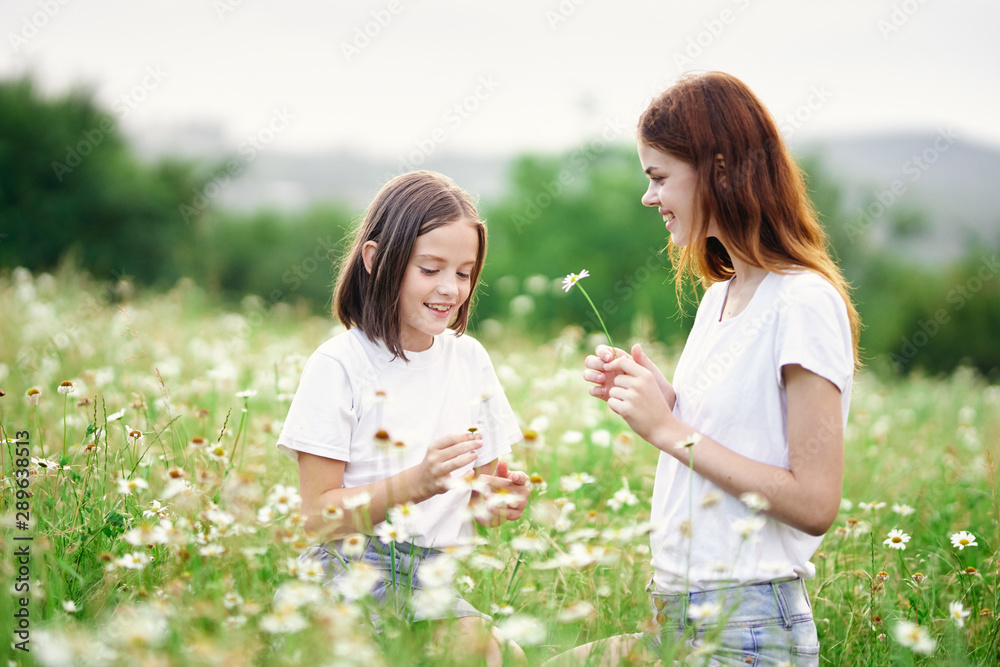 mother and daughter in the park mother and daughter in the park