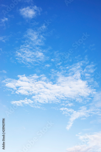 Obraz na płótnie Blue sky background and white clouds soft focus, and copy space w salonie