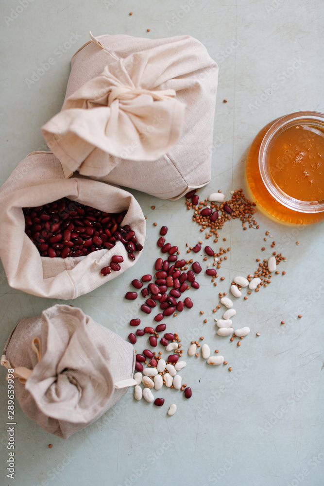 beans in linen bags and honey glass jar,zero waste