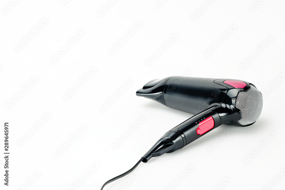 Hair dryer on white mat background with copy space Hair dryer on white mat background with copy space