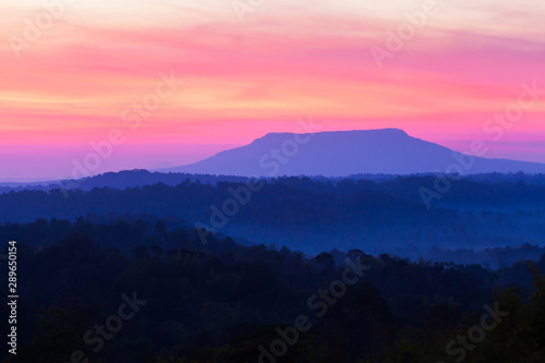 Scenery of blue mountain and sunrise sky.