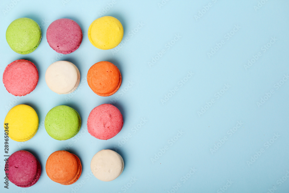 Bright background with a rows of macaroons and copy space Bright background with a rows of macaroons and copy space