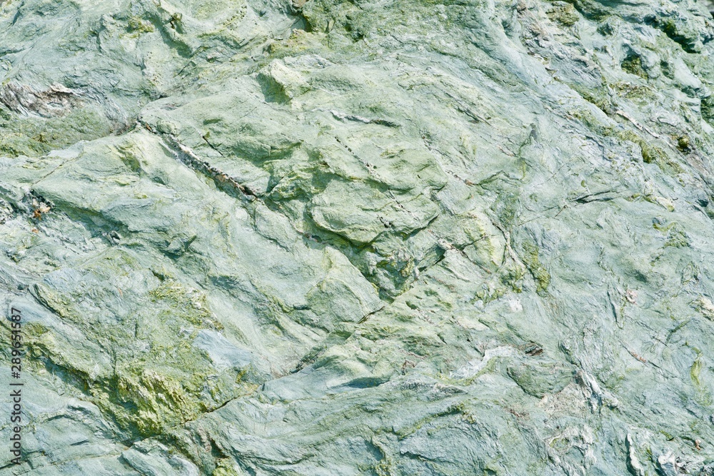 Green rough stone background