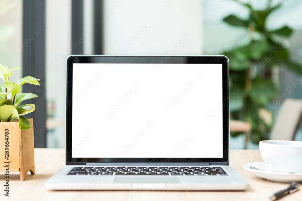 Mockup of laptop computer with empty screen with coffee cup on table of the coffee shop background,White screen