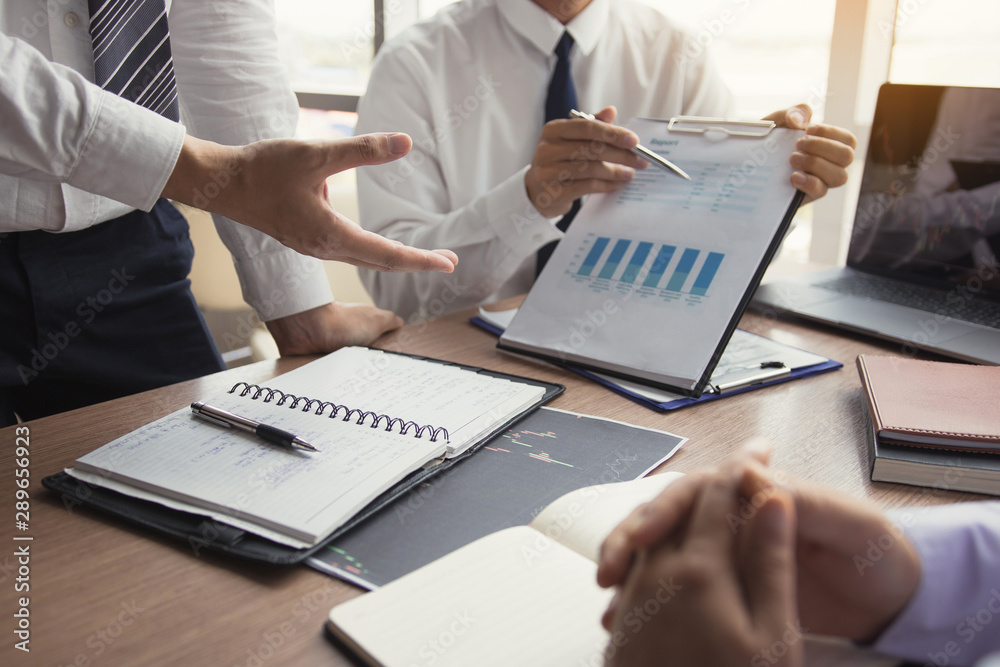 Partner colleagues are talking about the results in the document on hand and together analyze the work data about the company's financial statements. Partner colleagues are talking about the results in the document on hand and together analyze the work data about the company's financial statements.
