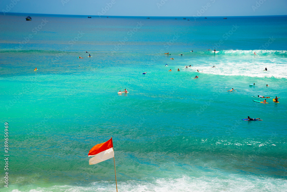 Surfers in Ocean - Bali - Indonesia