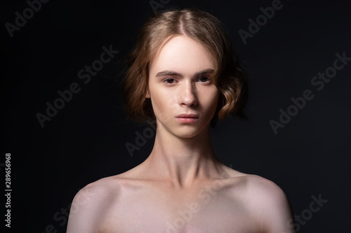 Portrait of a young attractive man. Androgyn model. photo