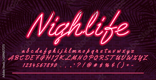 Neon light alphabet font, Red glowing hand drawn uppercase and lowercase letters, vector typeface typography design, brick wall background with tropical leaves