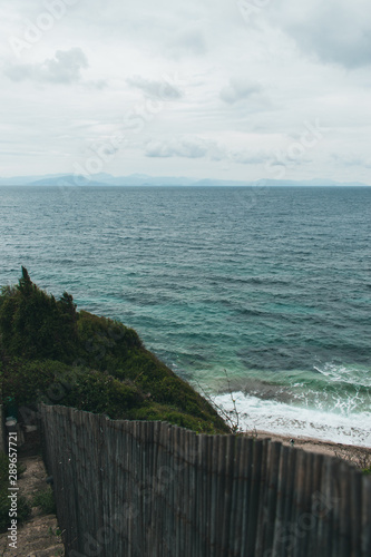 Vocation in Greece, Corfu. Water, cliff, mountains, and beautiful summer evening 