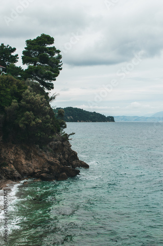 Vocation in Greece, Corfu. Water, cliff, mountains, and beautiful summer evening 