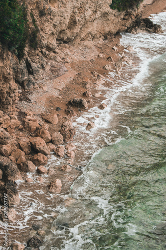 Vocation in Greece, Corfu. Water, cliff, mountains, and beautiful summer evening 