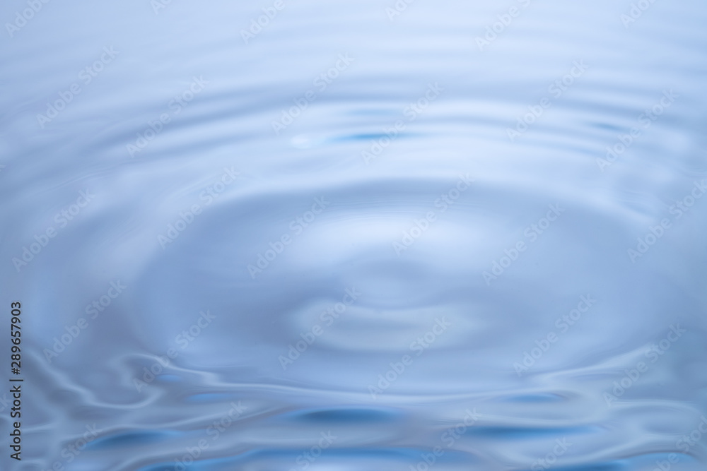 Abstract blue circle water drop ripple. Liquid texture background. Abstract blue circle water drop ripple. Liquid texture background.