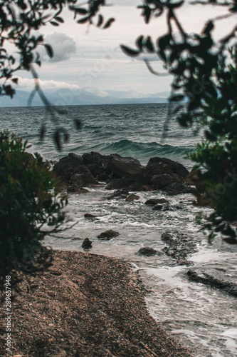 Vocation in Greece, Corfu. Water, cliff, mountains, and beautiful summer evening 