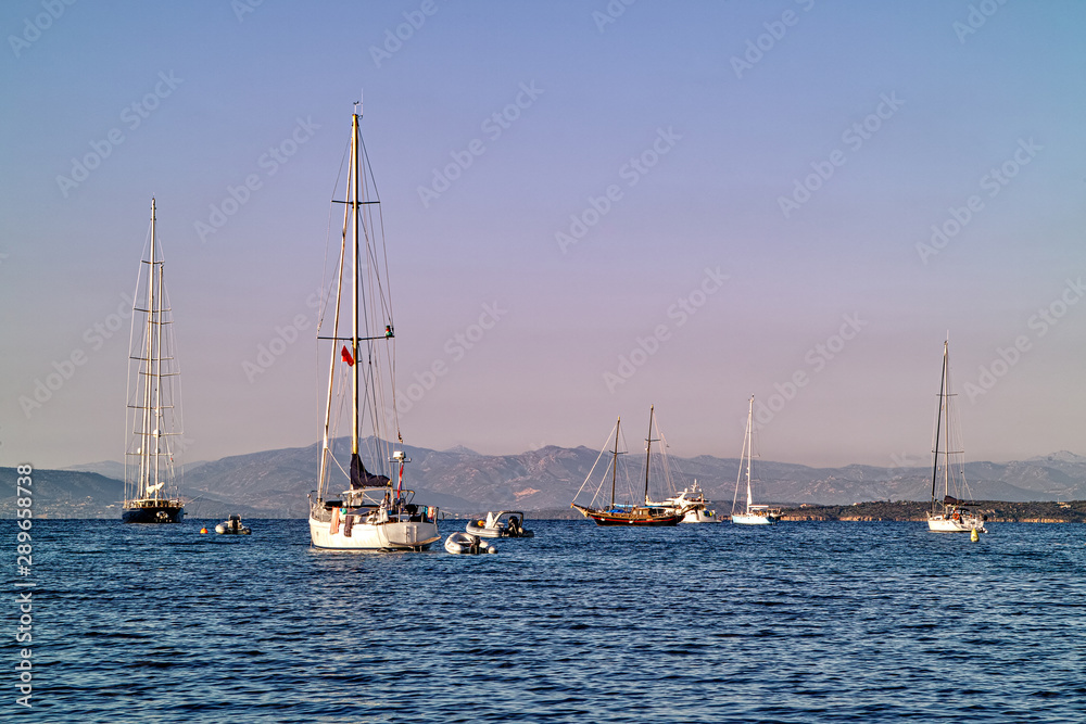 boats at anchor in Golfo Aranci , in Sardinia, Italy