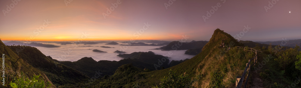 Panoramic view  morning sunrise at Phu Chi Dao, the unseen spot of sea fog on mountain peak  in Chiang Rai, Thailand. Panorama nature landscape