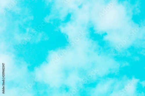 Abstract vector background texture of a vibrant teal blue sky with soft white clouds