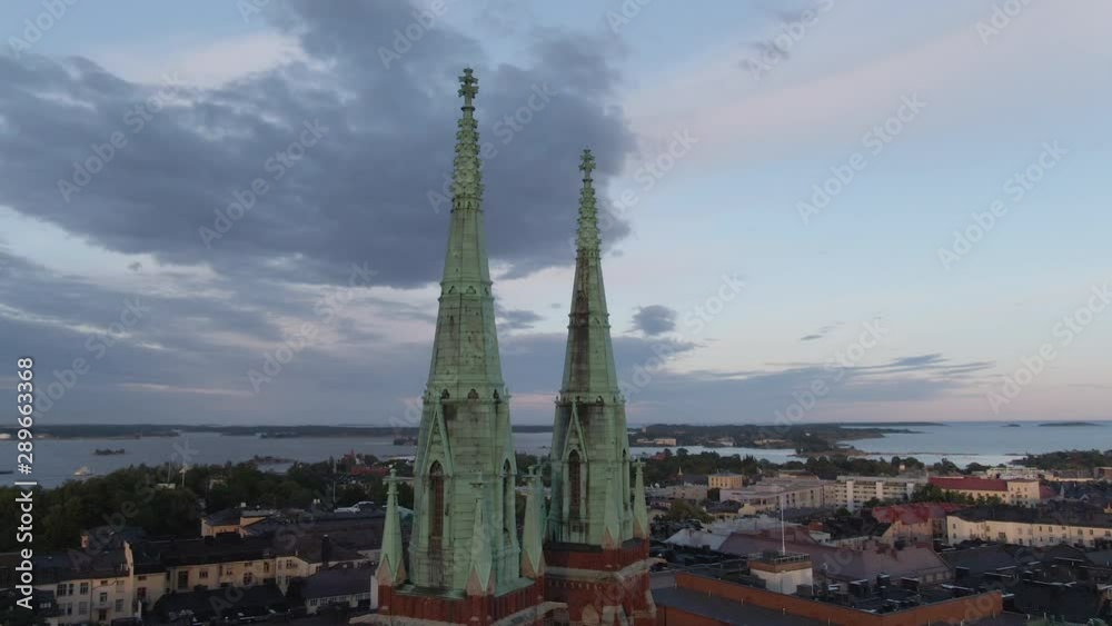 Drone flying near high church with two orthodox cross symbols. Religion Christian cross. Helsinki city. Drone flying near high church with two orthodox cross symbols. Religion Christian cross. Helsinki city.