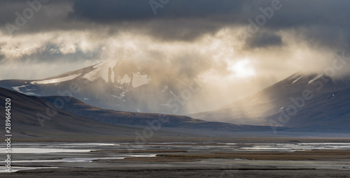 Sun breaks through in Adventdalen Svalbard