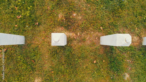 SREBRENICA, Potocari, Bosnia and Herzegovina Flying above the graves of murdered men and young boys civilians wictims from Serbian aggression and genocide in Potocari, on September 4, photo