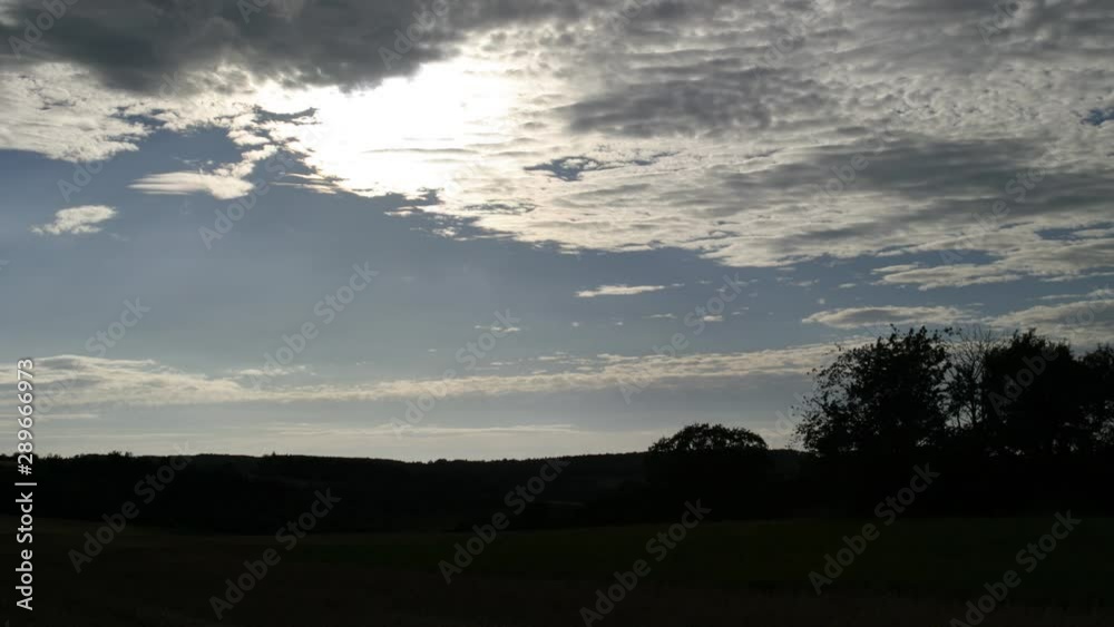 Time Lapse video of clouds rolling over rural landscape Time Lapse video of clouds rolling over rural landscape