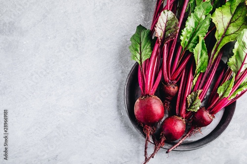 Bunch of fresh raw organic beets with leaves