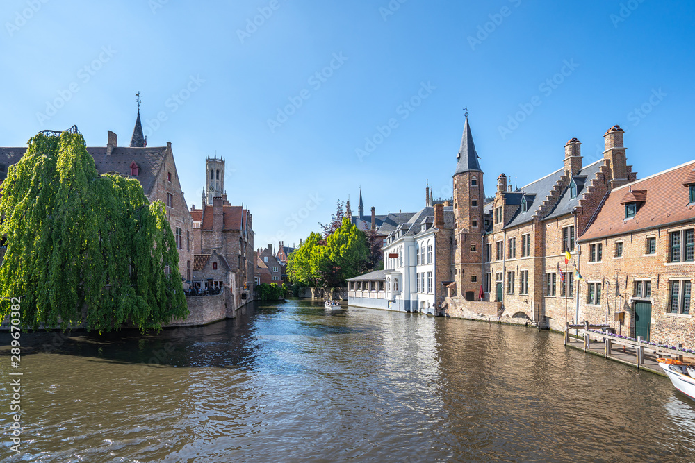 View of Bruges skyline and Rozenhoedkaai canal in Bruges, Belgium