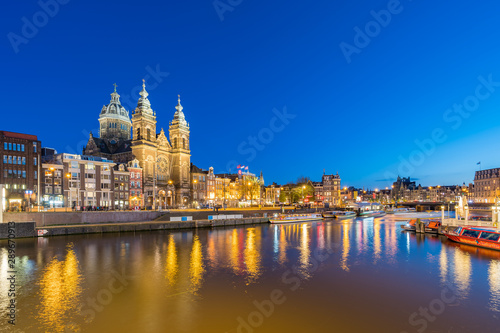 Amsterdam skyline with landmark buidings and canal in Amsterdam city  Netherlands