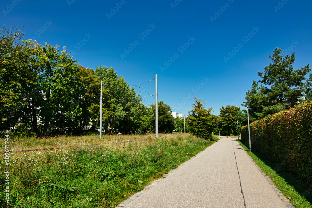 custom made wallpaper toronto digitalFootpath along a tram route, next to a residential area in Munich, Schwabing, Bavaria