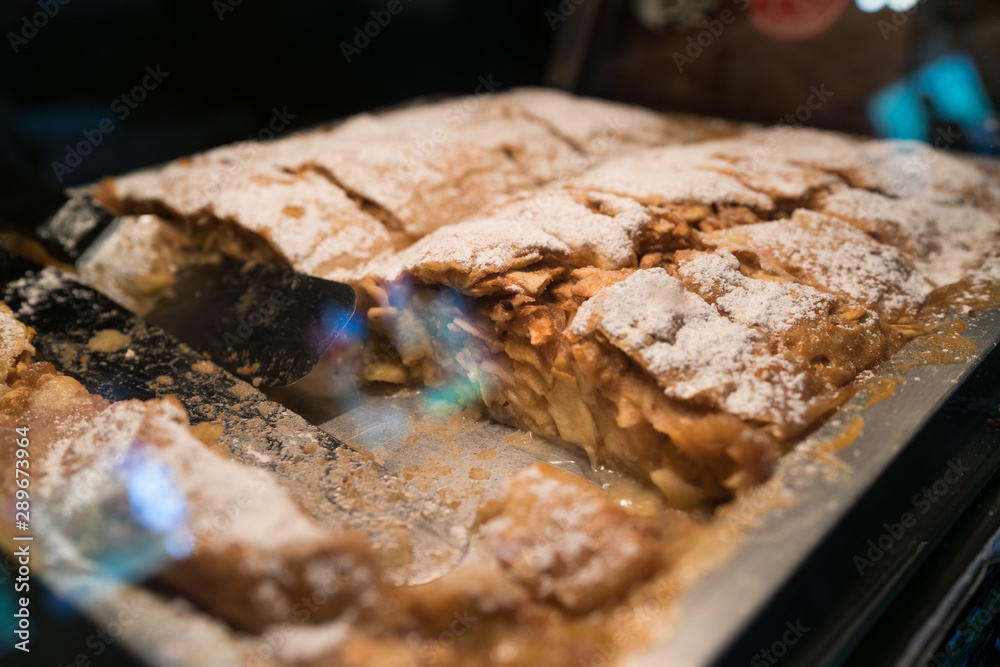 Preparation of strudel, apple pie, puff pastry, cinnamon and sugar typical of Austria and Trentino Alto Adige, dolomites and tyrol