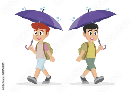 School boy with umbrella in the rain.