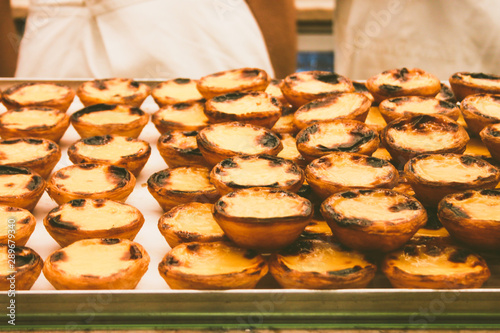 Yelow delitious portuguese pastry pasteis de nata photo