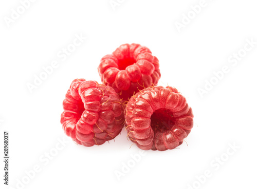 ripe raspberries on a white background close-up