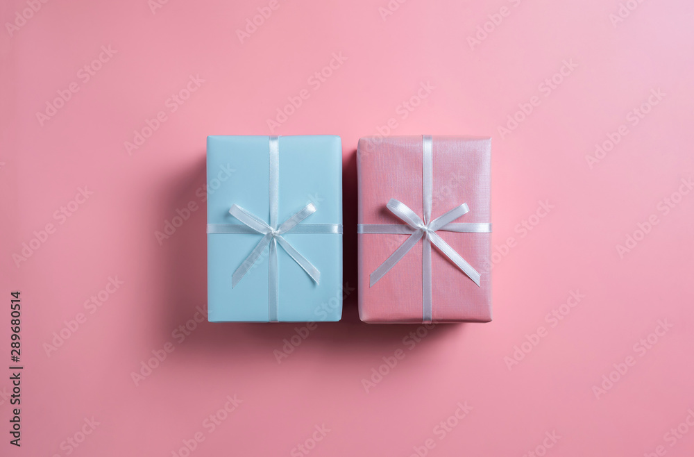 Top view of blue and pink gift boxes.