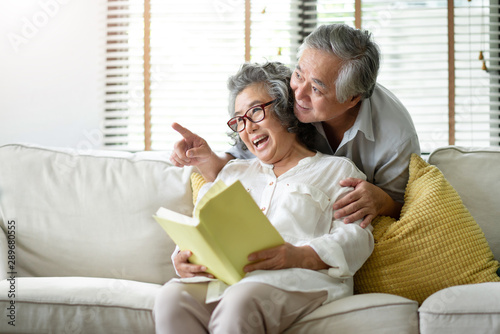 Asian Senior couple are relaxing at the house.