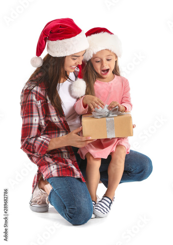Excited little girl opening...