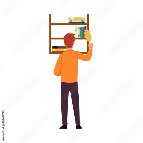 Man cleaning up dust from book shelves, cleaner dusting bookshelf on the wall