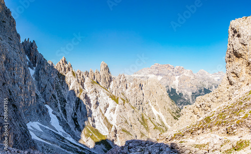 View from the Cristina fork near the Dolomite mountains near the Fratelli Fonda Savio refuge, Veneto - Italy photo