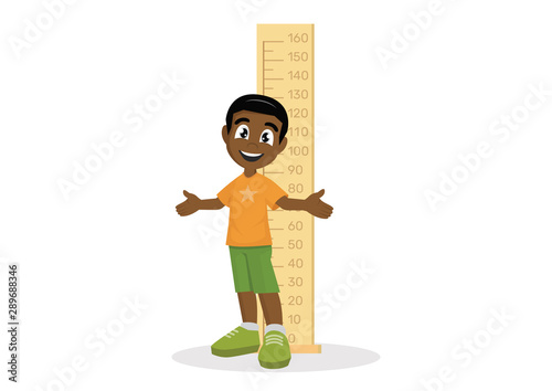 African Boy measuring height.
