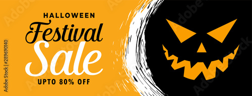 happy halloween sale banner with scary face