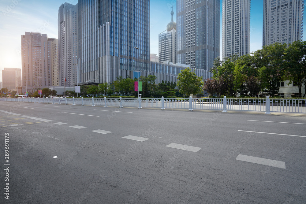 Fototapeta premium empty highway with cityscape and skyline of qingdao,China.