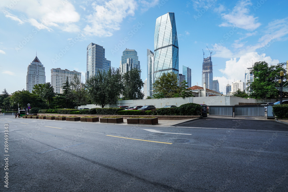 empty highway with cityscape and skyline of qingdao,China. empty highway with cityscape and skyline of qingdao,China.