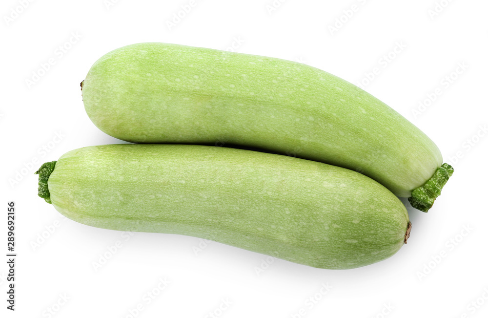 Fresh ripe zucchini squashes on white background, top view Fresh ripe zucchini squashes on white background, top view