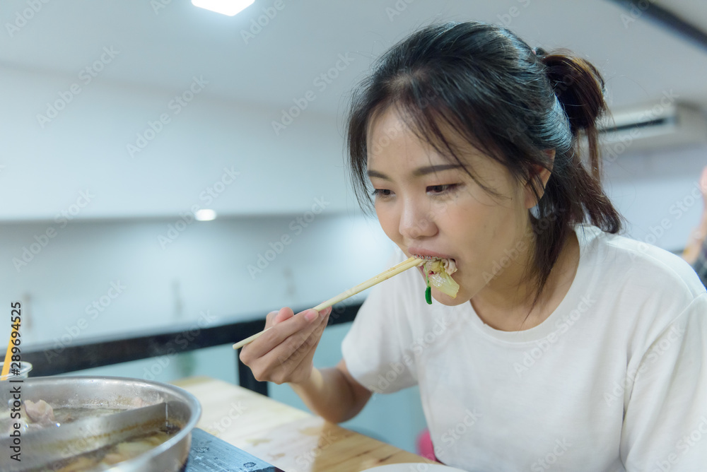 The girls are eating shabu,The girls enjoy eating shabu relaxing time food time The girls are eating shabu,The girls enjoy eating shabu relaxing time food time