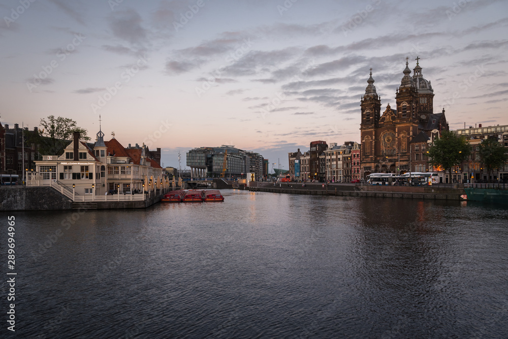 Sunset in Amsterdam canal, Netherlands