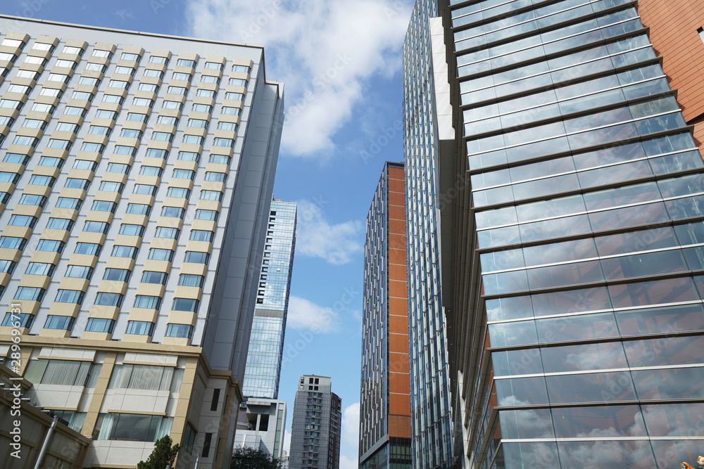 Skyscraper glass curtain wall, modern office building in Qingdao, China